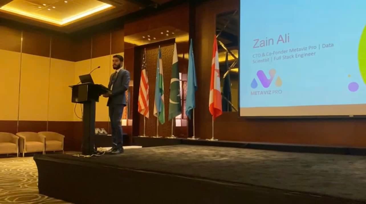 A Metaviz Pro co-founder presenting at a technology conference